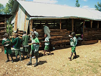 children carrying dishes