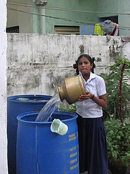 girl pouring water