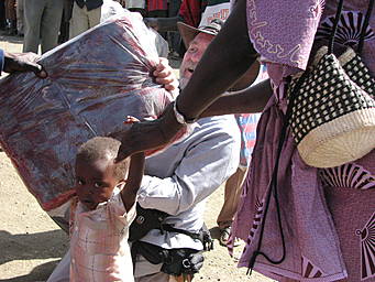 child receiving blanket