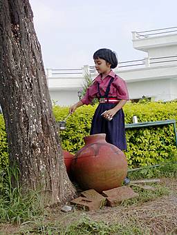 girl pouring water